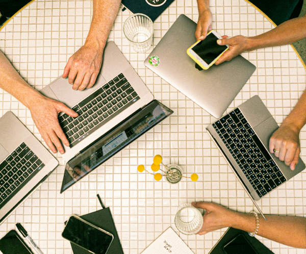 Photo Of People Using Laptop